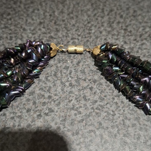 Torsade necklace used with iridescent carnival glass beads, 50cm