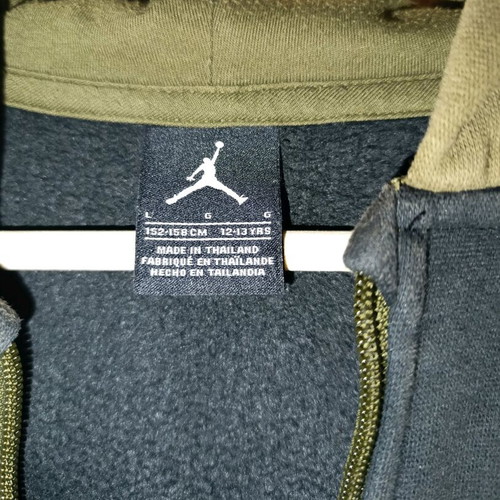 Jordan kids jacket used for ages 10 to 12, black and beige
