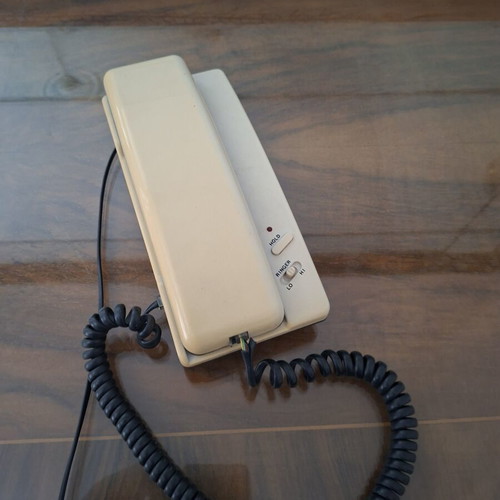 Vintage 90s wired home phone, decorative and functional