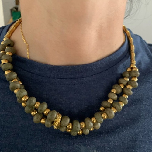 Necklace with khaki stone and gold used
