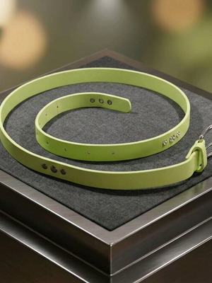 Women’s belt like new with metal eyelets in lime green
