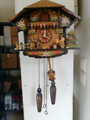 German cuckoo clock with motion and music, alpine theme