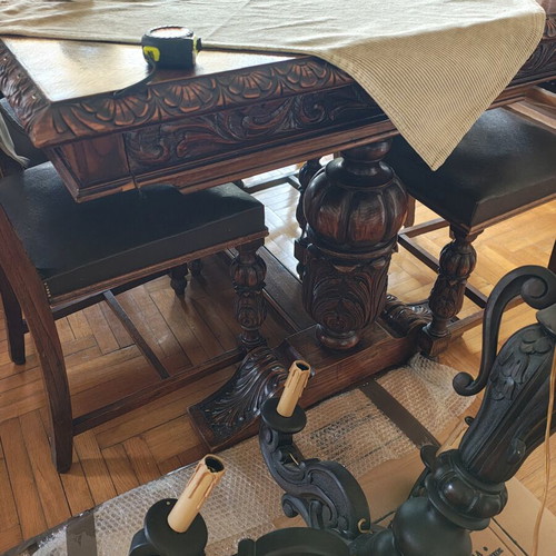 Old table with chairs and other furniture like new