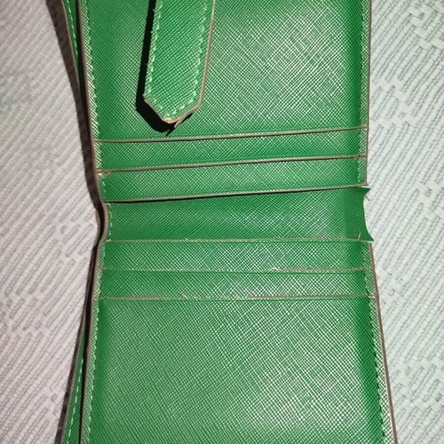 Small green wallet used