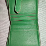 Small green wallet used