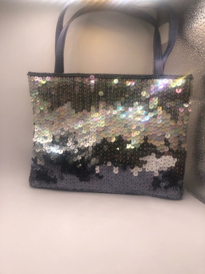 Branded women's handbag like new, handheld