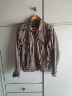 Diesel green jacket used, military style with many pockets