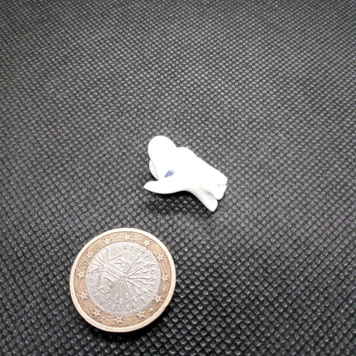 Porcelain elephant white miniature like new for crafts