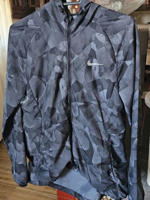 Nike women's light windbreaker jacket like new, size M, black and gray