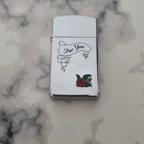 Zippo lighter used small size with engraved design