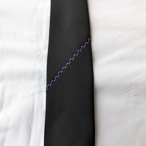 Dkny tie used polyester with lilac embroidery