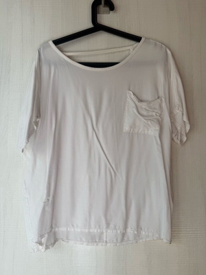 White women's blouse with pocket and open back used, size L or XL