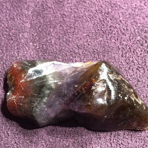 Auralite 23 natural authentic stone with colorful patterns