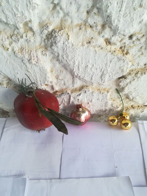 Decorative glass table ornaments like new pomegranate, garlic, grapes