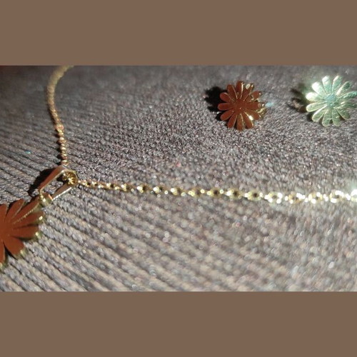 Daisy set made of gold-tone stainless steel new