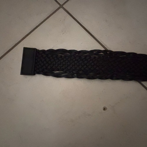 Black knitted belt like new with silver buckle and black stone