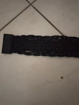 Black knitted belt like new with silver buckle and black stone