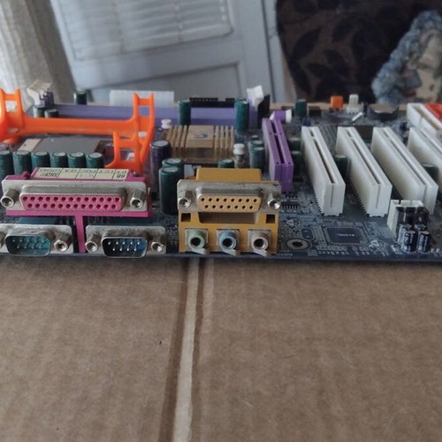 Gigabyte GA-8PE800 REV1.1 motherboard used with CPU, fan, and RAM