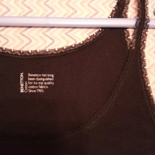 Benetton top size small black like new with lace