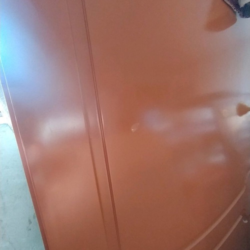 Lacquered entrance door used, terracotta exterior, white interior