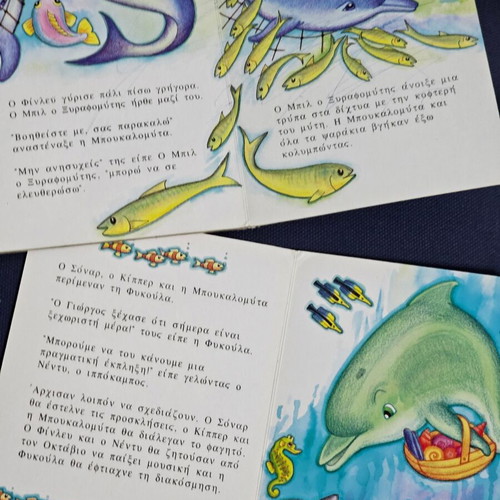 Dolphin books used, set of 2
