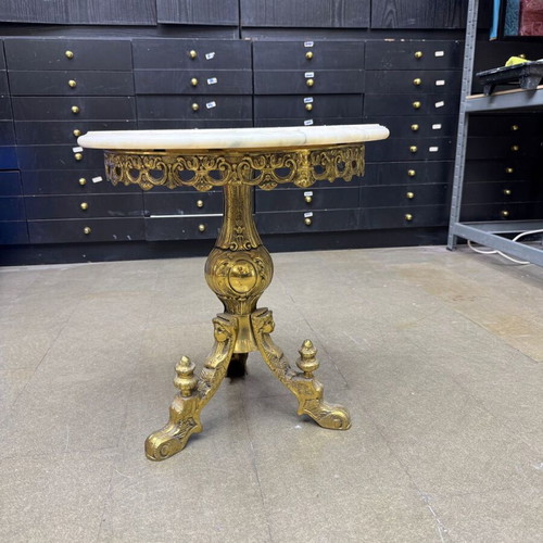Vintage brass coffee table with marble top used