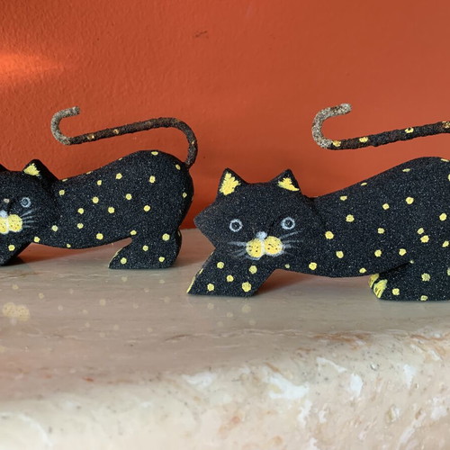 Set of two handmade wooden and sand cat figurines