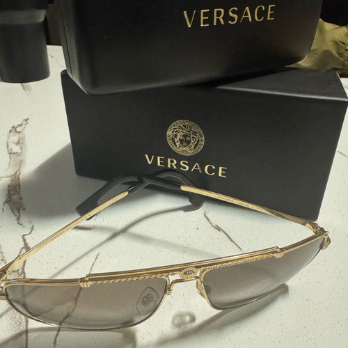 Versace Sunglasses like new, gold men's