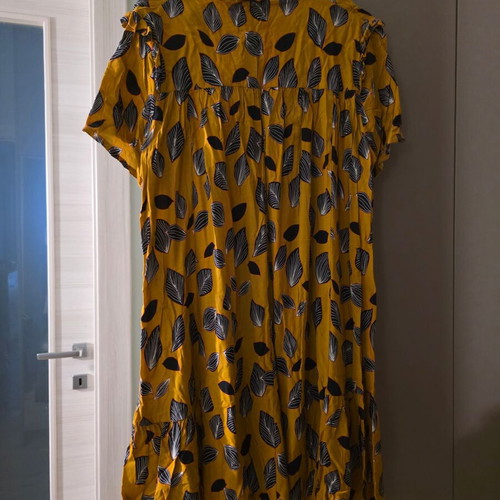 Moutaki dress used, mustard with floral and shape patterns, loose fit