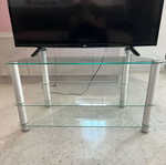 Γιάλινο τραπέζι TV σαν καινούργιο με ροδάκια 95cm-43cm