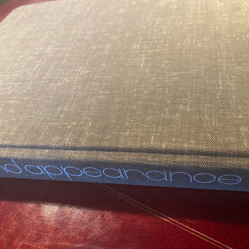 Behind Appearance hardcover book like new, English