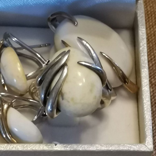 Silver 925 set with white stones used, possibly white coral