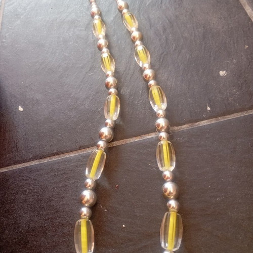 Vintage statement necklace used with graduated lucite beads and silver spheres
