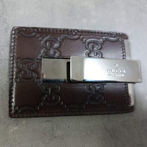 Gucci money clip in brown leather like new with embossed GG logo