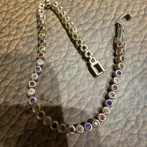 Tennis bracelet with multicolored round rhinestones and secure clasp