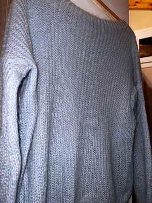Blue knitted sweater