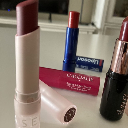 Lipsticks and lip balm used, branded set