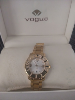 Vogue women's wristwatch like new, gold color