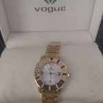 Vogue women's wristwatch like new, gold color