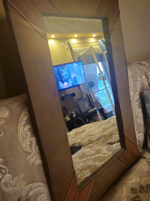 Wooden mirror used with leather decorative details, 51x76 cm
