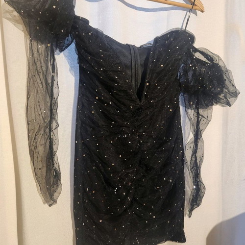 Black evening dress with V neckline and sheer sleeves in very good condition