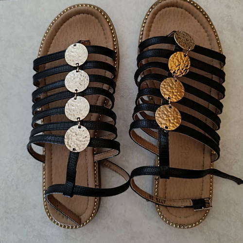 Black sandals with gold details like new