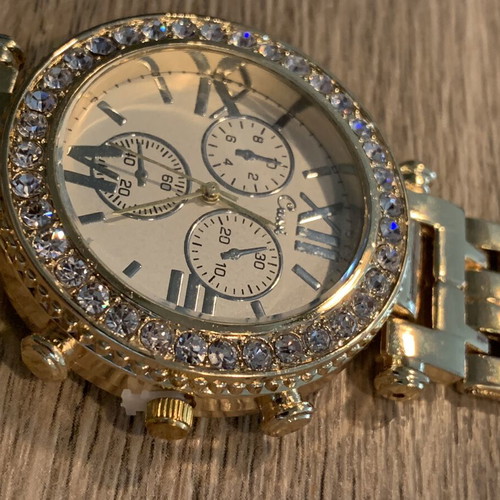 Golden wristwatch, women's