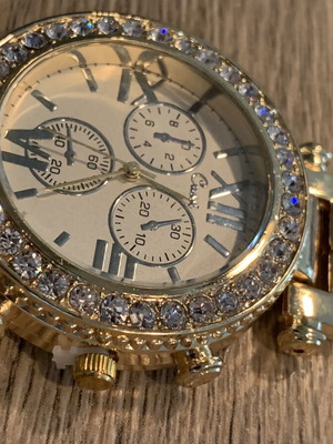 Golden wristwatch, women's