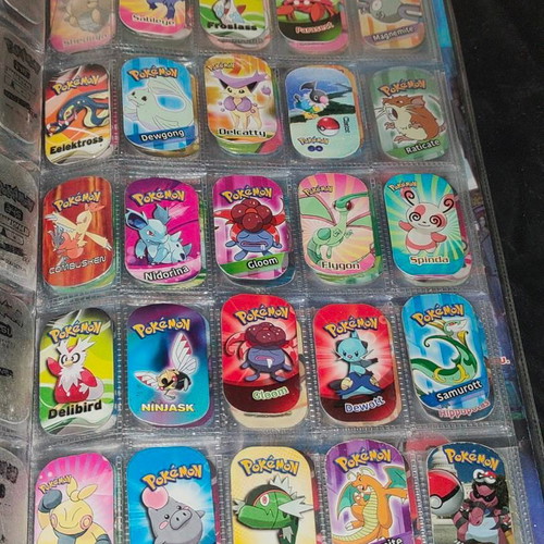 Pokemon GO The Original Metal Tags Album like new with 270 metal tags