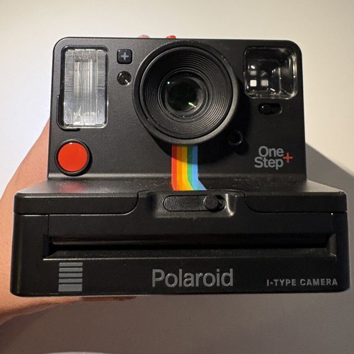 Polaroid One Step Plus instant camera with 1 film pack