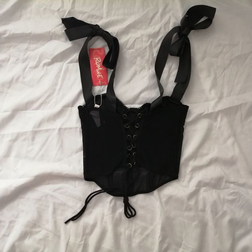 Women's black bustier corset top with sequins and sheer waist