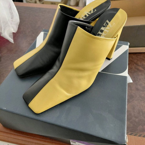 Leather Zara mules in black and yellow, like new