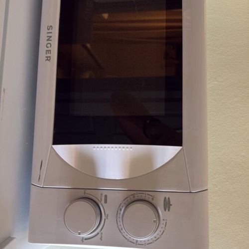 Singer microwave oven