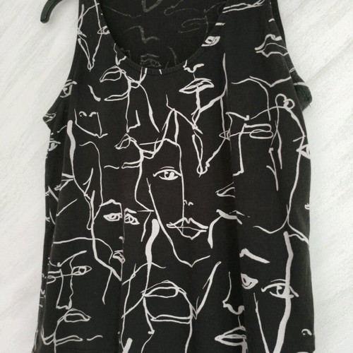 Stradivarius black sleeveless top with face pattern like new, Medium